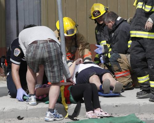 BORIS.MINKEVICH@FREEPRESS.MB.CA  100411 BORIS MINKEVICH / WINNIPEG FREE PRESS MVC at the corner of Erin and Ellice sent many people to hospital.