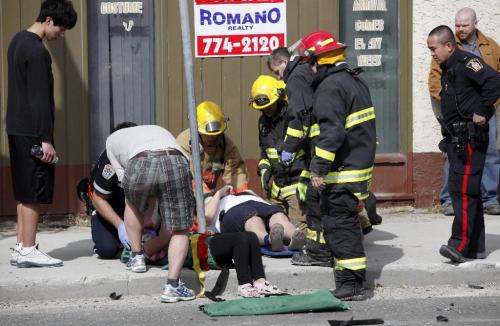 BORIS.MINKEVICH@FREEPRESS.MB.CA  100411 BORIS MINKEVICH / WINNIPEG FREE PRESS MVC at the corner of Erin and Ellice sent many people to hospital.