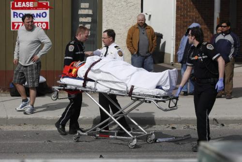 BORIS.MINKEVICH@FREEPRESS.MB.CA  100411 BORIS MINKEVICH / WINNIPEG FREE PRESS MVC at the corner of Erin and Ellice sent many people to hospital.