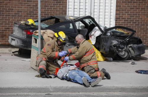 BORIS.MINKEVICH@FREEPRESS.MB.CA  100411 BORIS MINKEVICH / WINNIPEG FREE PRESS MVC at the corner of Erin and Ellice sent many people to hospital.