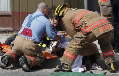 BORIS.MINKEVICH@FREEPRESS.MB.CA  100411 BORIS MINKEVICH / WINNIPEG FREE PRESS MVC at the corner of Erin and Ellice sent many people to hospital.