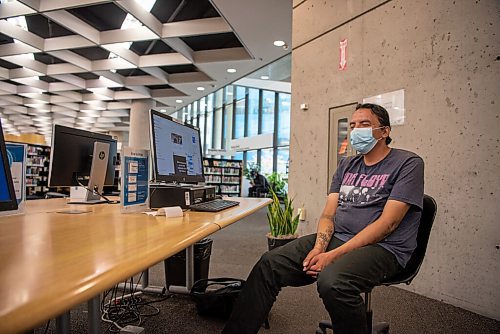 ALEX LUPUL / WINNIPEG FREE PRESS  

Travis Flitt is photographed at the Millennium Library in Winnipeg on Monday, July 26, 2021.

Reporter: Cody Sellar