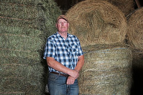Canstar Community News Jürgen Kohler stands in his hay barn near Brunkild on July 22. The barn was only half full  at this time of year, it should be packed, Kohler said. (GABRIELLE PICHÉ/CANSTAR COMMUNITY NEWS/HEADLINER)
