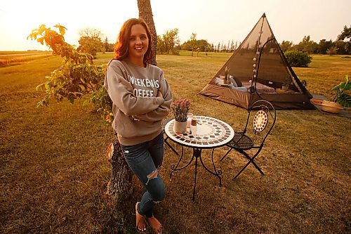 JOHN WOODS / WINNIPEG FREE PRESS
Shaelene Demeria, co-owner of Backyard Bookings, sets up one of her rentable teepee-style tents Monday, July 26, 2021. Demeria and her fiance Mike Ross have started a company that rents a tee-pee style glamping experience for the clients own backyard.

Reporter: Sanderson