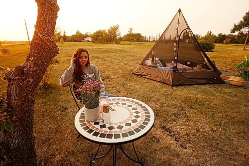 JOHN WOODS / WINNIPEG FREE PRESS
Shaelene Demeria, co-owner of Backyard Bookings, sets up one of her rentable teepee-style tents Monday, July 26, 2021. Demeria and her fiance Mike Ross have started a company that rents a tee-pee style glamping experience for the clients own backyard.

Reporter: Sanderson