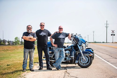 MIKAELA MACKENZIE / WINNIPEG FREE PRESS

Kirk Van Alstyne (left), Moe Sabourin, and Ed Johner, motorcycling enthusiasts who co-founded and organize the Manitoba Motorcycle Ride for Dad, pose for a portrait with their bikes in Headingley on Tuesday, July 27, 2021. For Aaron Epp story.
Winnipeg Free Press 2021.
