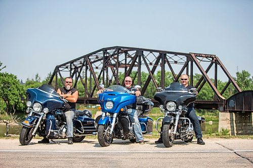 MIKAELA MACKENZIE / WINNIPEG FREE PRESS

Kirk Van Alstyne (left), Ed Johner, and Moe Sabourin, motorcycling enthusiasts who co-founded and organize the Manitoba Motorcycle Ride for Dad, pose for a portrait with their bikes in Headingley on Tuesday, July 27, 2021. For Aaron Epp story.
Winnipeg Free Press 2021.