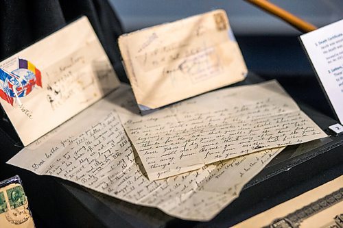 MIKAELA MACKENZIE / WINNIPEG FREE PRESS

Letters from home for Jacob Cornelson, one of the few prairie Mennonites who joined the military service during the way, in the Mennonites at War exhibit at the Mennonite Heritage Village Museum in Steinbach on Tuesday, July 27, 2021. For Brenda story.
Winnipeg Free Press 2021.