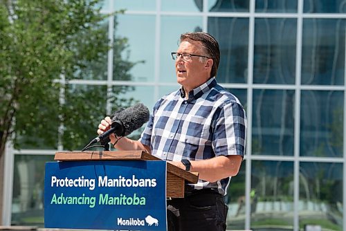 ALEX LUPUL / WINNIPEG FREE PRESS  

Greg Burnett, executive director, Downtown Community Safety Partnership (DCSP), is photographed during a press conference, providing a one-year update on Downtown Community Safety Partnership, at Millennium Library Park in Winnipeg on Tuesday, July, 27, 2021.