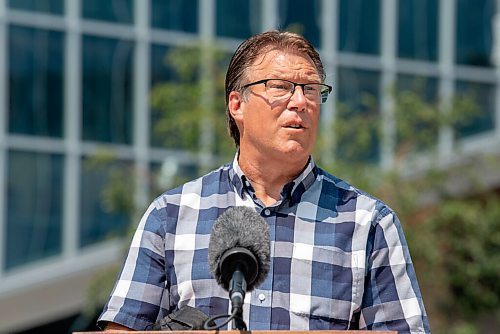 ALEX LUPUL / WINNIPEG FREE PRESS  

Greg Burnett, executive director, Downtown Community Safety Partnership (DCSP), is photographed during a press conference, providing a one-year update on Downtown Community Safety Partnership, at Millennium Library Park in Winnipeg on Tuesday, July, 27, 2021.