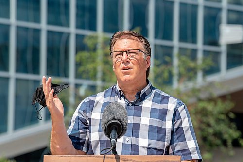 ALEX LUPUL / WINNIPEG FREE PRESS  

Greg Burnett, executive director, Downtown Community Safety Partnership (DCSP), is photographed during a press conference, providing a one-year update on Downtown Community Safety Partnership, at Millennium Library Park in Winnipeg on Tuesday, July, 27, 2021.