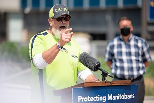 ALEX LUPUL / WINNIPEG FREE PRESS  

Mitch Bourbonniere, community outreach liason, Downtown Community Safety Partnership (DCSP), is photographed during a press conference, providing a one-year update on Downtown Community Safety Partnership, at Millennium Library Park in Winnipeg on Tuesday, July, 27, 2021.