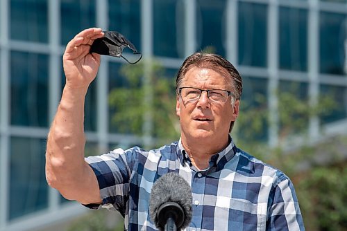ALEX LUPUL / WINNIPEG FREE PRESS
Greg Burnett, executive director, Downtown Community Safety Partnership (DCSP), is photographed during a press conference, providing a one-year update on Downtown Community Safety Partnership, at Millennium Library Park in Winnipeg on Tuesday, July, 27, 2021.