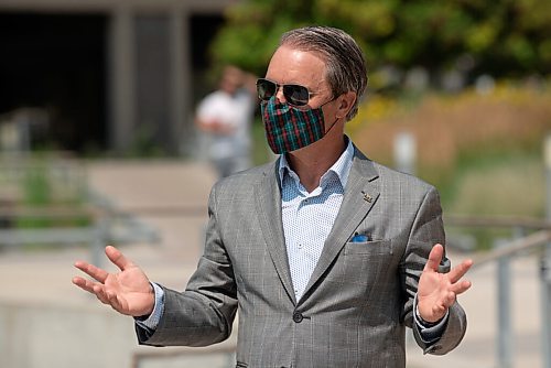 ALEX LUPUL / WINNIPEG FREE PRESS  

Justice Minister Cameron Friesen is photographed during a press conference, providing a one-year update on Downtown Community Safety Partnership, at Millennium Library Park in Winnipeg on Tuesday, July, 27, 2021.