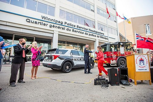 MIKAELA MACKENZIE / WINNIPEG FREE PRESS

Sherri Rollins, city councillor, elbow-bumps Chad Swayze, chair of the 2023 World Police & Fire Games, at a press conference at the Winnipeg Police Service headquarters marking two years from the start of the event in Winnipeg on Wednesday, July 28, 2021. For --- story.
Winnipeg Free Press 2021.