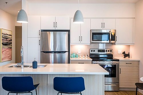 MIKAELA MACKENZIE / WINNIPEG FREE PRESS

The kitchen in a brand new demo suite in Stationside at Jubilee in Fort Rouge in Winnipeg on Wednesday, July 28, 2021. For Todd story.
Winnipeg Free Press 2021.