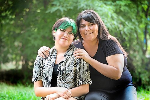 RUTH BONNEVILLE / WINNIPEG FREE PRESS

SUNSHINE FUND

Portrait of Katherine Ross (13yrs) with her mom Spring Ross, in their back yard.  

Subject: photo of mother Spring Ross and her daughter Katherine for the Sunshine Fund story. Katherine will be attending Pioneer Camp.

Reporter: Gillian Brown

July 29, 2021
