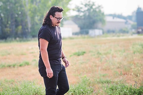 MIKAELA MACKENZIE / WINNIPEG FREE PRESS

Darian McKinney poses for a portrait on the site of the St. Boniface Industrial School (this would have been the back yard area behind the school) in Winnipeg on Thursday, July 29, 2021. For Dylan story.
Winnipeg Free Press 2021.