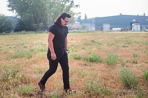 MIKAELA MACKENZIE / WINNIPEG FREE PRESS

Darian McKinney poses for a portrait on the site of the St. Boniface Industrial School (this would have been the back yard area behind the school) in Winnipeg on Thursday, July 29, 2021. For Dylan story.
Winnipeg Free Press 2021.