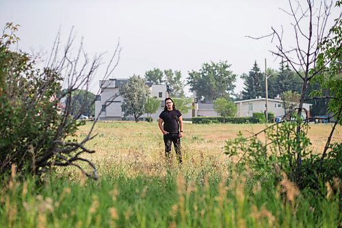 MIKAELA MACKENZIE / WINNIPEG FREE PRESS

Darian McKinney poses for a portrait on the site of the St. Boniface Industrial School (this would have been the back yard area behind the school) in Winnipeg on Thursday, July 29, 2021. For Dylan story.
Winnipeg Free Press 2021.