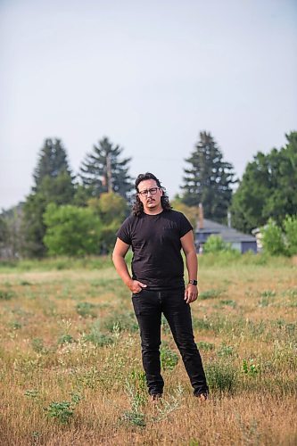 MIKAELA MACKENZIE / WINNIPEG FREE PRESS

Darian McKinney poses for a portrait on the site of the St. Boniface Industrial School (this would have been the back yard area behind the school) in Winnipeg on Thursday, July 29, 2021. For Dylan story.
Winnipeg Free Press 2021.