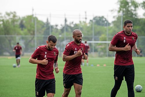 ALEX LUPUL / WINNIPEG FREE PRESS  

From left, Valour FC's Keven Steven
Alemán Bustos, Andy
Baquero Ruiz and Amir Amizis
Soto Espinoza are photographed during practice at St. Vital Memorial Park in Winnipeg on Friday, July, 30, 2021.