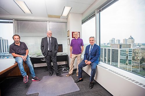 MIKAELA MACKENZIE / WINNIPEG FREE PRESS

Saul Simmonds (left), Evan Roitenberg, Jeff Gindin, and Richard Wolson pose for a photo at their criminal law firm, which is splitting up after 25 years in business, in Winnipeg on Friday, July 30, 2021. For Dean story.
Winnipeg Free Press 2021.