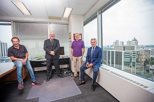 MIKAELA MACKENZIE / WINNIPEG FREE PRESS

Saul Simmonds (left), Evan Roitenberg, Jeff Gindin, and Richard Wolson pose for a photo at their criminal law firm, which is splitting up after 25 years in business, in Winnipeg on Friday, July 30, 2021. For Dean story.
Winnipeg Free Press 2021.