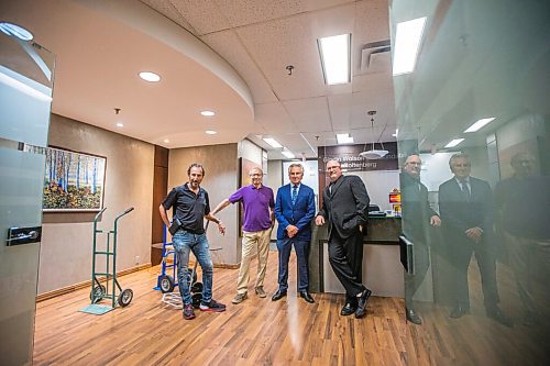 MIKAELA MACKENZIE / WINNIPEG FREE PRESS

Saul Simmonds (left), Jeff Gindin, Richard Wolson, and Evan Roitenberg pose for a photo at their criminal law firm, which is splitting up after 25 years in business, in Winnipeg on Friday, July 30, 2021. For Dean story.
Winnipeg Free Press 2021.