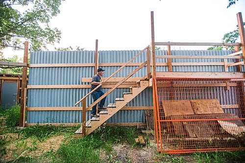 MIKAELA MACKENZIE / WINNIPEG FREE PRESS

Roger Stearns walks up the steps to a viewing platform at Black Bear Rescue Manitoba near Stonewall on Wednesday, July 7, 2021. For Eva Wasney story.
Winnipeg Free Press 2021.