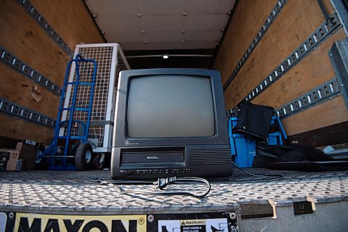 MIKE SUDOMA / Winnipeg Free Press
An old television sits in the back of a moving trucks as University student, Aira Villanuvea hosts an electronic waste drop off event at Tyndall Park Community Centre Friday evening 
July 30, 2021