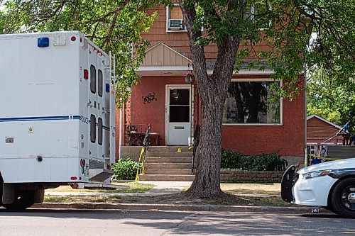 MIKE SUDOMA / Winnipeg Free Press
Police caution tape drapes down a staircase at a residence within the 400 block of Arlington St Saturday afternoon
July 31, 2021