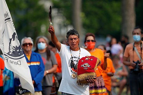 JOHN WOODS / WINNIPEG FREE PRESS
Adam McDonald, who is walking with his brother from Fort Mac to Ottawa, leads the grand entrance at an Every Child Matters pop-up powwow at Vimy Ridge Park Sunday, August 1, 2021. 

Reporter: Sellar