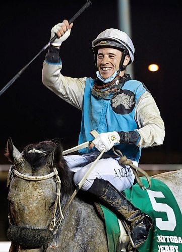 JOHN WOODS / WINNIPEG FREE PRESS
Alexander Marti riding Uncharacteristic (5) wins the Manitoba Derby at Assiniboia Downs Monday, August 2, 2021. 

Reporter: ?