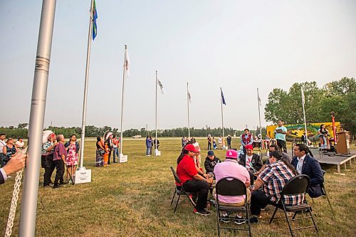 MIKAELA MACKENZIE / WINNIPEG FREE PRESS

Treaty 1 chiefs raise flags as the Spirit Sands Singers sing a song at a commemoration of the 150th anniversary of the making of Treaty No. 1 at the Lower Fort Garry National Historic Site on Tuesday, Aug. 3, 2021. For Gabrielle Piche story.
Winnipeg Free Press 2021.