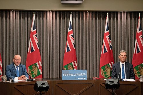 ALEX LUPUL / WINNIPEG FREE PRESS

Dr. Brent Roussin, chief provincial public health officer, and Premier Brian Pallister are photographed during a press conference at the Legislative Building in Winnipeg on Tuesday, August 3, 2021, announcing looser COVID-19 restrictions for Manitobans.