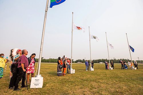 MIKAELA MACKENZIE / WINNIPEG FREE PRESS

Treaty 1 chiefs raise flags at a commemoration of the 150th anniversary of the making of Treaty No. 1 at the Lower Fort Garry National Historic Site on Tuesday, Aug. 3, 2021. For Gabrielle Piche story.
Winnipeg Free Press 2021.