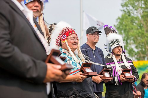 MIKAELA MACKENZIE / WINNIPEG FREE PRESS

Peguis chief Glenn Hudson (left), Roseau River councillor Mike Seenie, and Sandy Bay chief Trevor Prince pose for a photo with other Treaty No. 1 chiefs and community leaders at a commemoration of the 150th anniversary of the making of Treaty No. 1 at the Lower Fort Garry National Historic Site on Tuesday, Aug. 3, 2021. For Gabrielle Piche story.
Winnipeg Free Press 2021.
