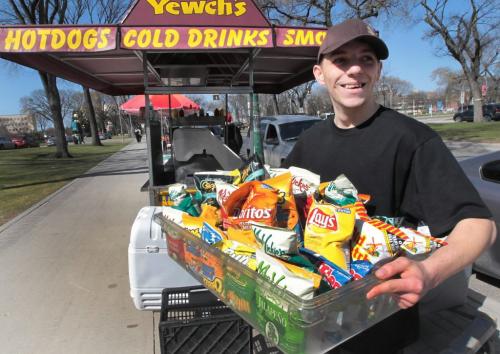 JOE.BRYKSA@FREEPRESS.MB.Ca  Local-- 4 /20 ready-  Franz Scharf of Yewch"s Dogs stocks up the poatato chips on his hot dog cart at the Manitoba Legislature Tuesday- He and many other food vendors hope to cash in from the influx of youths that will assemble through out the day to smoke pot to mark 4/20 day- 4/20 day is held annually on Apr. 20 and is widely known as the pot holiday  where everyone in attendance smokes weed at 4:20 p.m. on 4/20  protesting pot prohibition-  Apr 20, 2010- JOE BRYKSA/WINNIPEG FREE PRESS