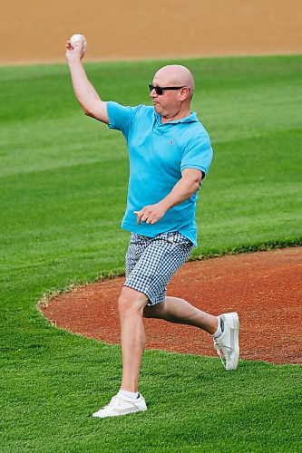 JOHN WOODS / WINNIPEG FREE PRESS
Dr Brent Roussin throws the first pitch before the Winnipeg Goldeyes game against the Sioux City Explorers Tuesday, August 3, 2021. 

Reporter: SAwtzky