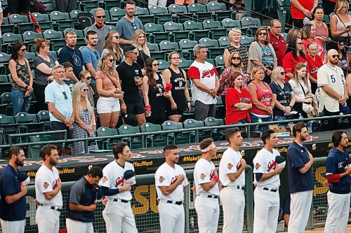 JOHN WOODS / WINNIPEG FREE PRESS
Fans and players stand for anthems at Winnipeg Goldeyes game against the Sioux City Explorers Tuesday, August 3, 2021. 

Reporter: SAwtzky