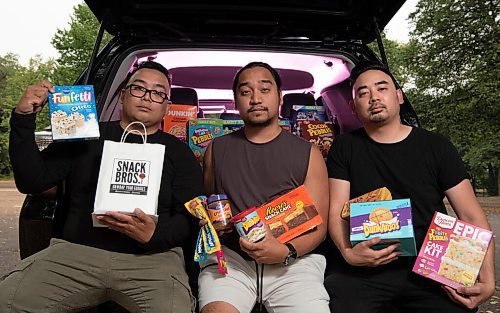 ALEX LUPUL / WINNIPEG FREE PRESS  

From left, Joel, Jeremy and Jason Revereza, the three brothers behind the Winnipeg company Snack Bros WPG, which offers exclusive and exotic snacks, are photographed on Tuesday, August 3, 2021.