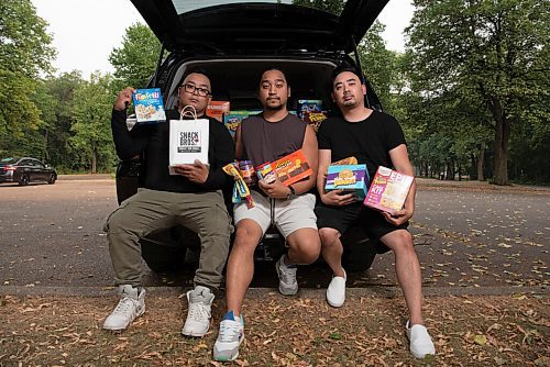 ALEX LUPUL / WINNIPEG FREE PRESS  

From left, Joel, Jeremy and Jason Revereza, the three brothers behind the Winnipeg company Snack Bros WPG, which offers exclusive and exotic snacks, are photographed on Tuesday, August 3, 2021.