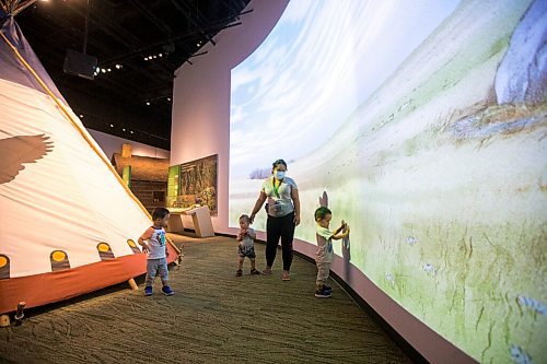 MIKAELA MACKENZIE / WINNIPEG FREE PRESS

Subo Sun (left), Max Laroche, Xiaoqing Yuan, and Suhn Sun check out the prairie exhibit at the Manitoba Museum on opening day in Winnipeg on Thursday, Aug. 5, 2021. Standup.
Winnipeg Free Press 2021.