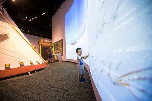 MIKAELA MACKENZIE / WINNIPEG FREE PRESS

One-year-old Suhn Sun checks out the prairie exhibit at the Manitoba Museum on opening day in Winnipeg on Thursday, Aug. 5, 2021. Standup.
Winnipeg Free Press 2021.