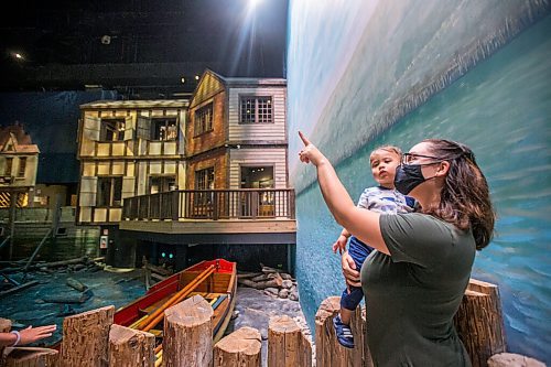 MIKAELA MACKENZIE / WINNIPEG FREE PRESS

Tori Branzuela and her son, Elliot (one), check out the Nonsuch exhibit at the Manitoba Museum on opening day in Winnipeg on Thursday, Aug. 5, 2021. Standup.
Winnipeg Free Press 2021.