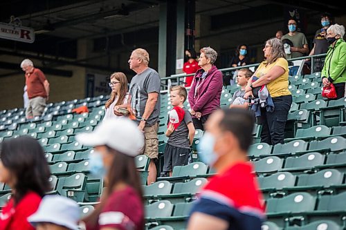 MIKAELA MACKENZIE / WINNIPEG FREE PRESS

Fans stand for Oh Canada before the Goldeyes play Sioux City at Shaw Park in Winnipeg on Thursday, Aug. 5, 2021. For Mike Sawatzky story.
Winnipeg Free Press 2021.