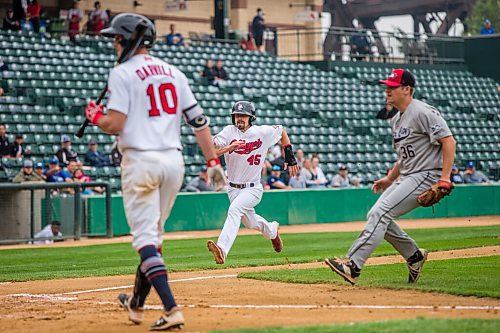MIKAELA MACKENZIE / WINNIPEG FREE PRESS

 Dakota Conners runs towards home base (to get the first home run of the game) as the Goldeyes play Sioux City in Winnipeg on Thursday, Aug. 5, 2021. For Mike Sawatzky story.
Winnipeg Free Press 2021.