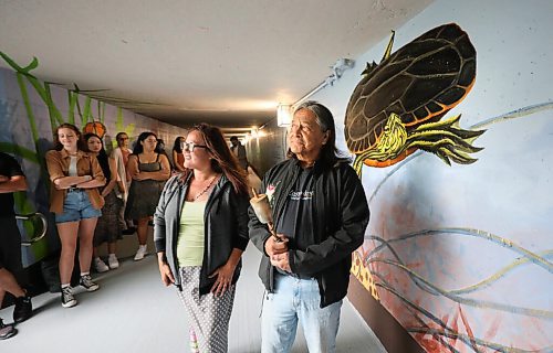 RUTH BONNEVILLE / WINNIPEG FREE PRESS

LOCAL - Fermor Tunnel Mural 

Rolling River First Nation Jeannie Whitebird and Peter Atkinso, elder from ROSEAU RIVER ANISHINABE FIRST NATION, provided teaching and blessing for the the newly painted tunnel under Fermor Ave. at the press conference Thursday.  


Aug 5 2021
