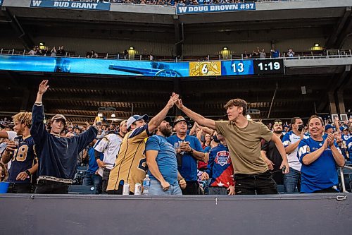 ALEX LUPUL / WINNIPEG FREE PRESS  

Winnipeg Blue Bomber fans are photographed at IG Field during the opening game of the 2021 CFL season.